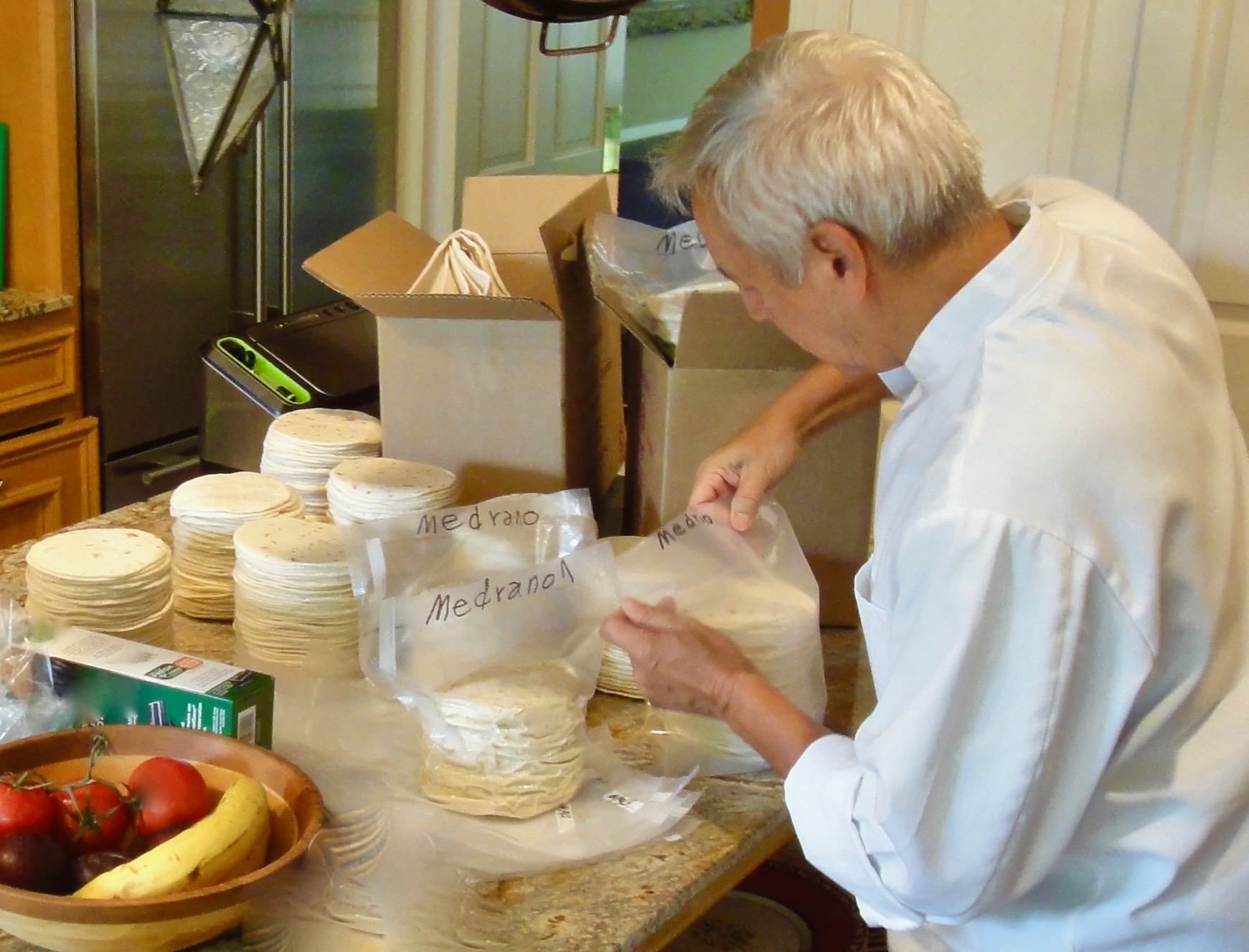 Chef Medrano Packs Tortillas for Cooking Tacos In Moscow