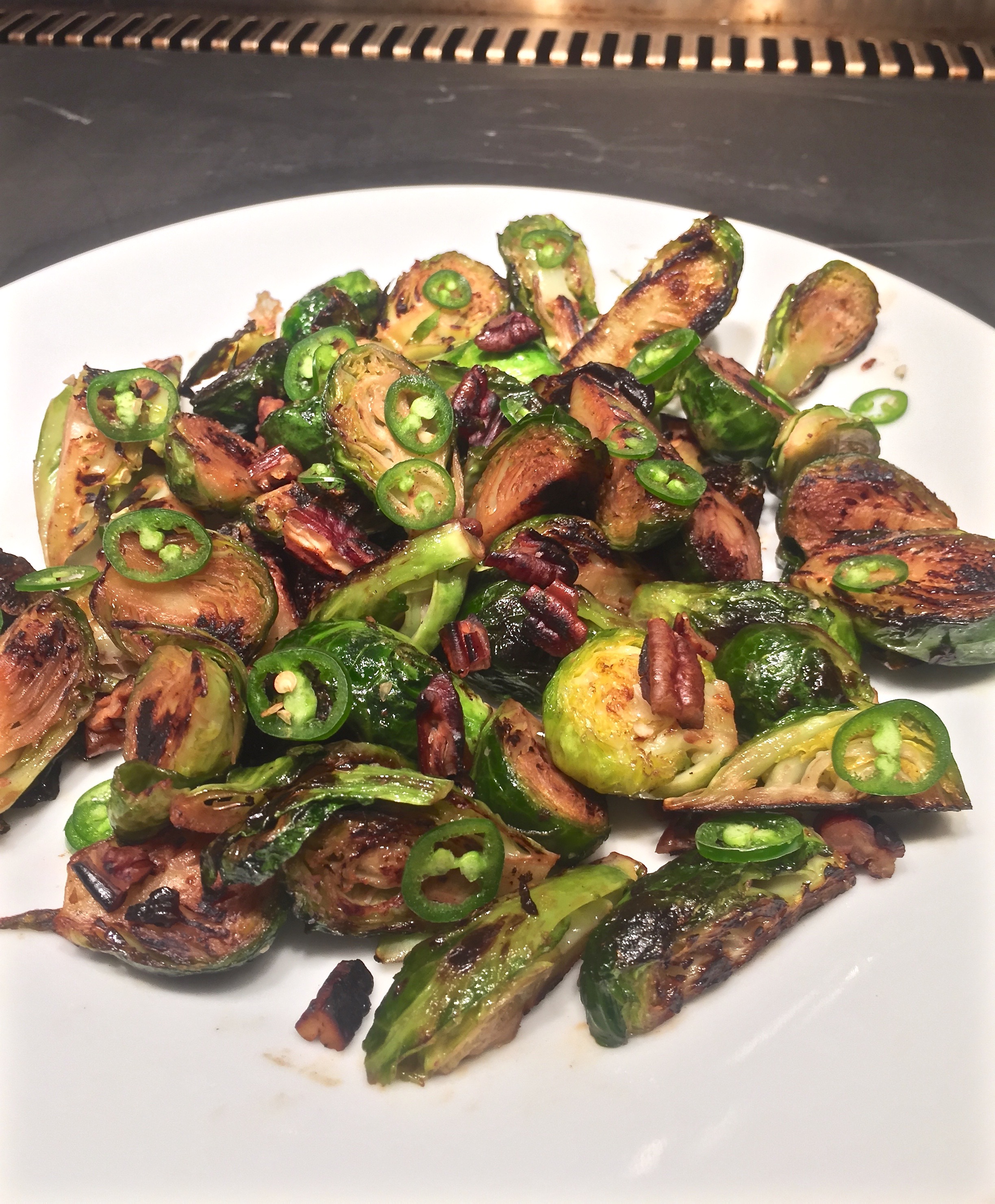Brussels Sprouts with pecans and Serrano Chiles