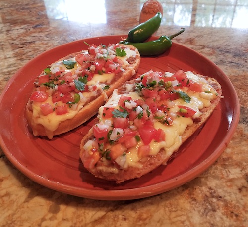 Molletes — this Mexican sandwich is sumptuous, hot and fresh!